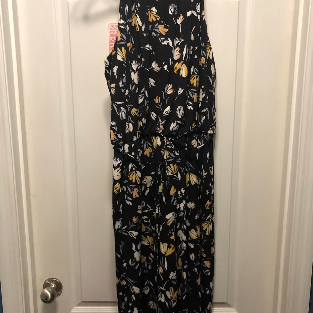 Black floral Capri length romper with pockets!